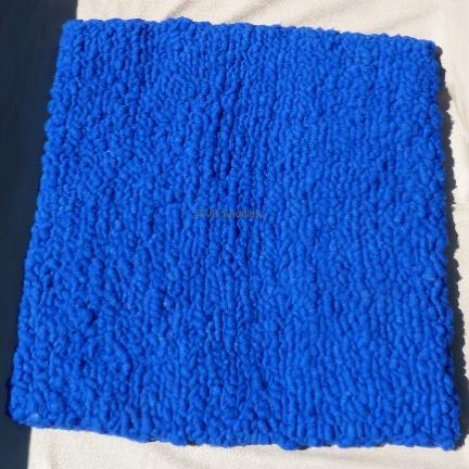 A plain blue saddle pad